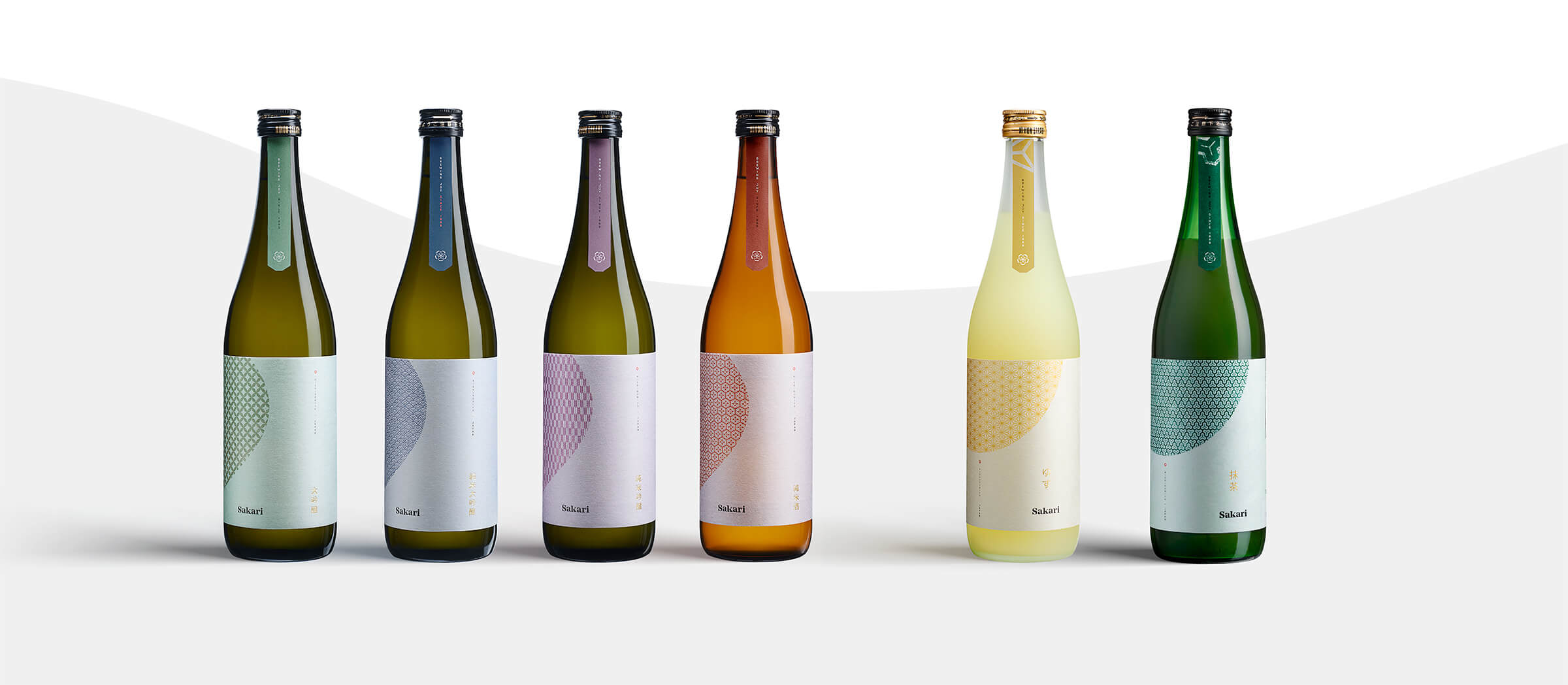 sakari sake product lineup showing consistency and authenticity in the label design, each characterized by a unique color and pattern, from the Japanese tradition