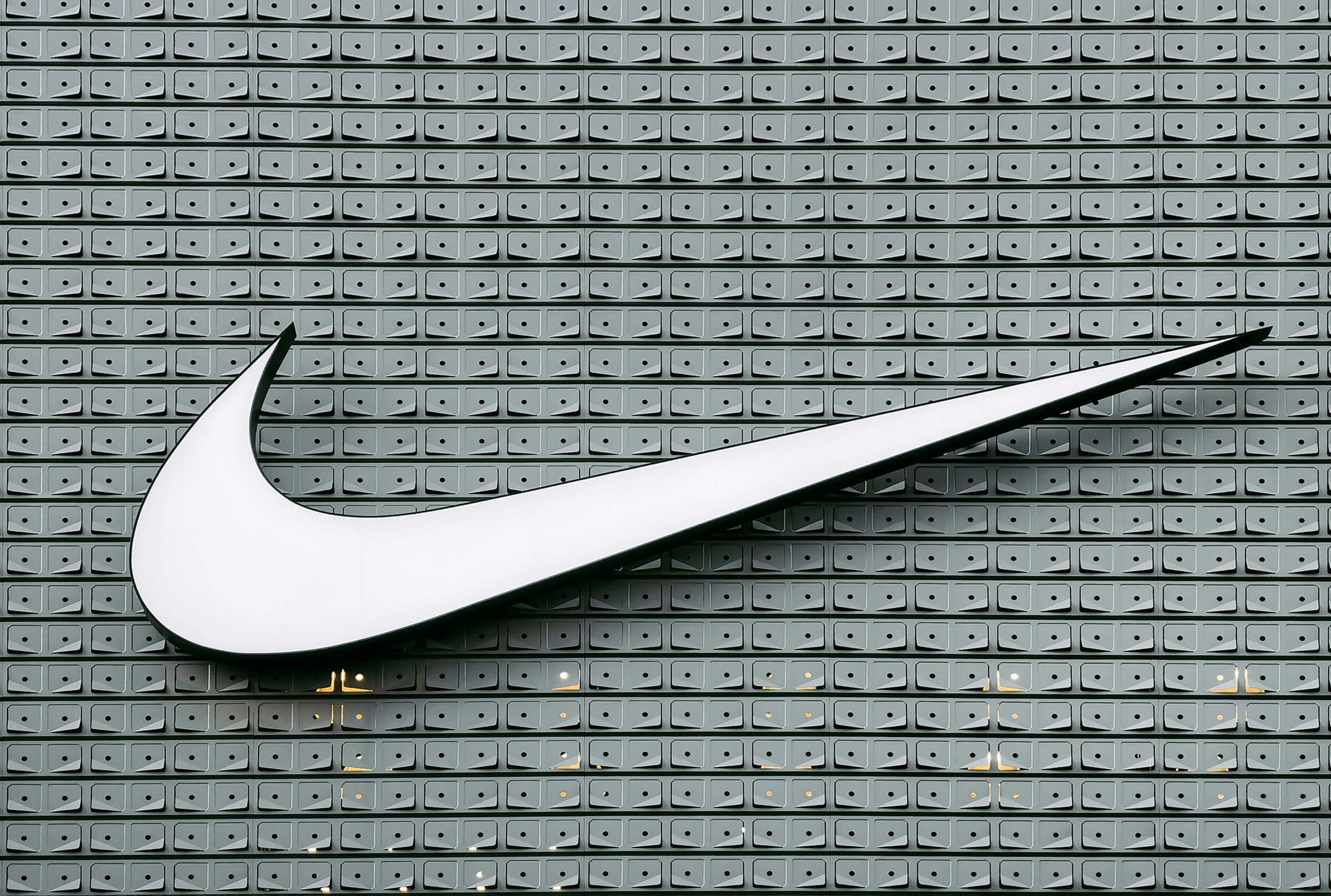 branding agency or marketing agency Nike logo design creating by a branding agency