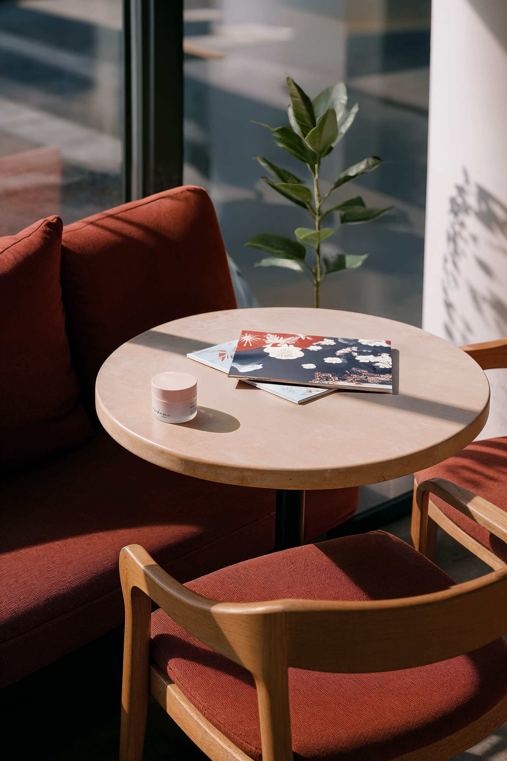 maikasui handcare cream minimal delicate packaging sustainable in a cozy cafe