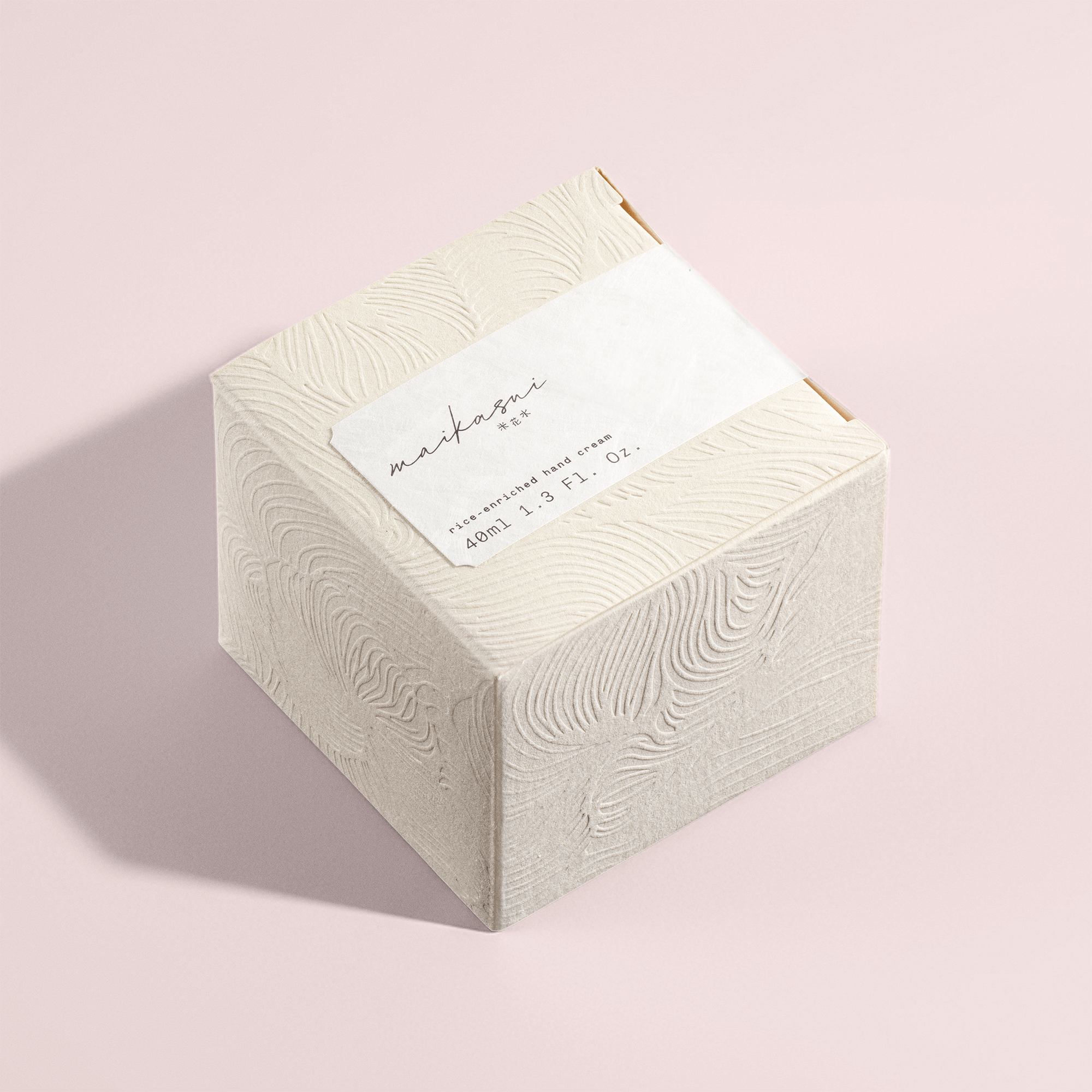 kome kami sustainable embossed paper packaging for maikasui hand cream cosmetic product and brand