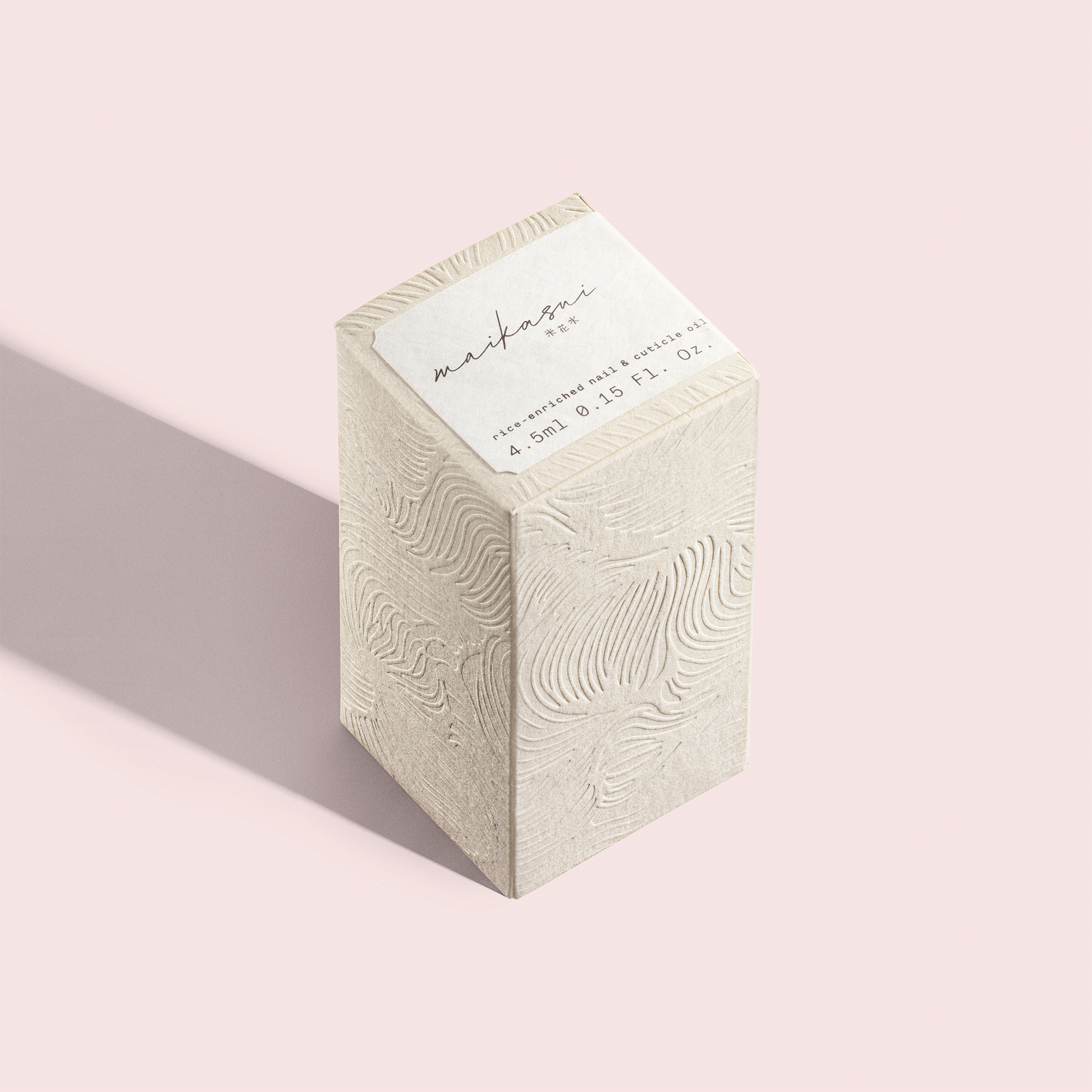 kome kami sustainable embossed paper packaging for maikasui nail oil cosmetic product and brand